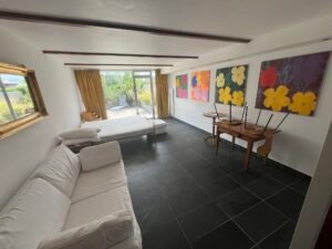 Living room with large windows in Crans-Montana ski studio